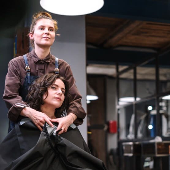 Professional consultation with hairdresser in Brisbane discussing colour options